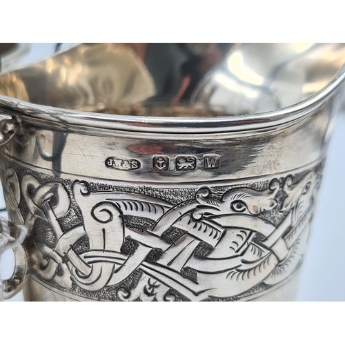16 - Star Lot: An excellent example of a Sterling Silver Celtic design sugar bowl and Helmet cream jug. T... 