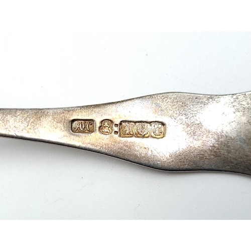 34 - A Georgian-Scottish sterling silver sauce ladle, which features a finely detailed shell finial. Hall... 