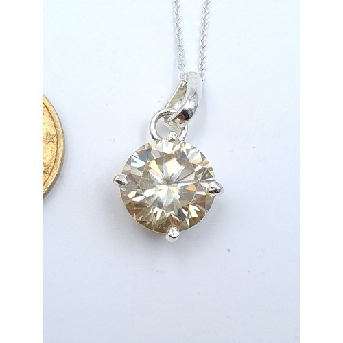 59 - A brilliant White Mossianite 9.3 carat necklace, set with a sterling silver chain. Huge sparkle to t... 