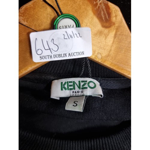 643 - A very striking, designer crew-neck jumper by KENZO, Paris. A very stylish black jumper with a large... 