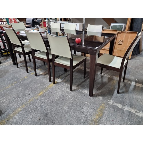 644 - Star lot : A designer Calligaris  sleek modern tempered glass top dining table with tapered legs and... 