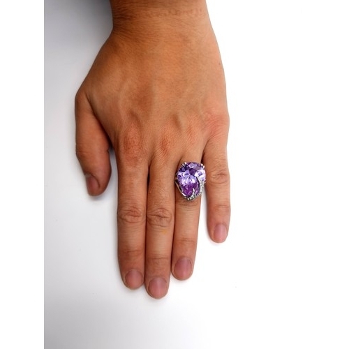 522 - A stunning generous Amythyst ring, with a facet cut to stone and an excellent sparkle. Set in sterli... 