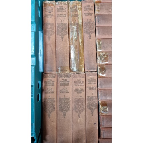 583 - A large selection of antique books, including twenty nine of 'The Novels of Charles Dickens' along w... 