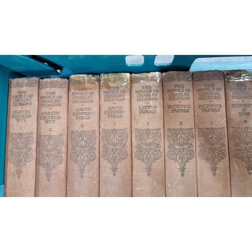 583 - A large selection of antique books, including twenty nine of 'The Novels of Charles Dickens' along w... 