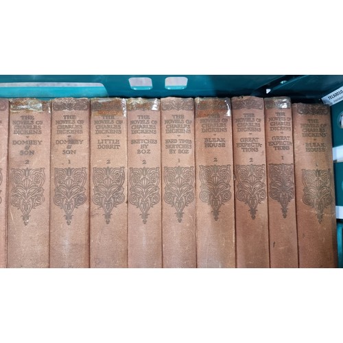 583 - A large selection of antique books, including twenty nine of 'The Novels of Charles Dickens' along w... 