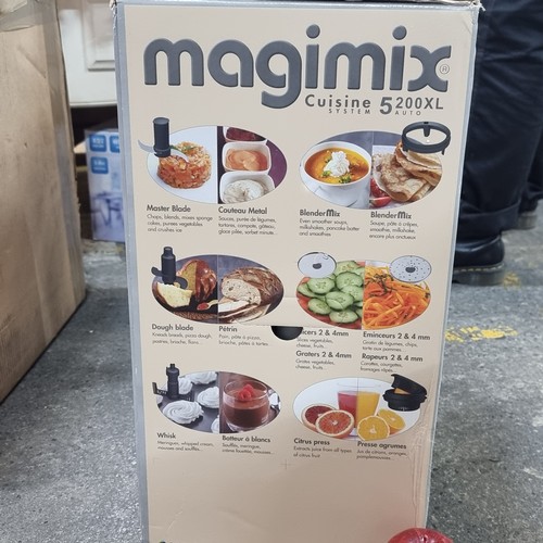 602 - Star lot : A Magimix Cuisine Systeme premium food processor, with a variety of attachments. In origi... 