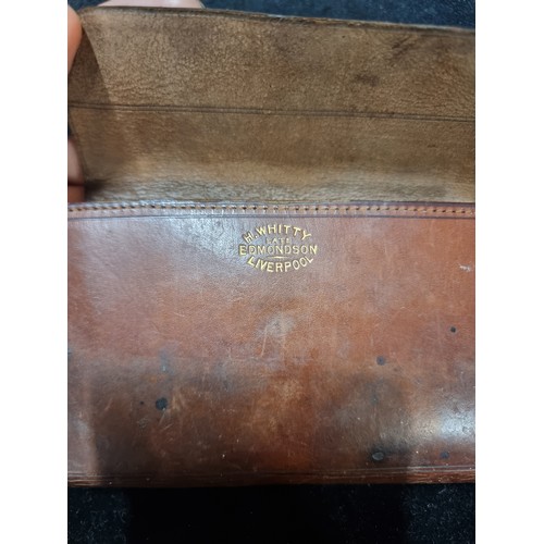 107 - A very interesting pair of genuine leather bound fly fishing wallets, including a H. Whitty Late Edm... 