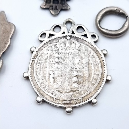 533 - A great collection of four sterling silver medallions, comprising of two 18 Gold inlayed examples. T... 