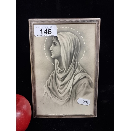 146 - A wonderful vintage sterling silver picture frame containing a print profile portrait of the Virgin ... 