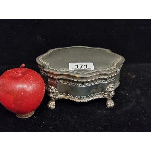 171 - A very lovely heavy EPNS jewellery box. With a hinged lid and burgundy red velvet interior. Supporte... 