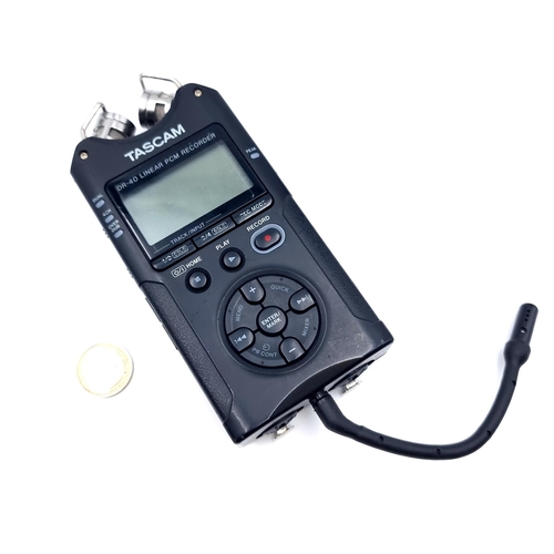 27 - A Tascam professional handheld 4-track drone recorder. Model: DR-40. This item features a XLR input,... 
