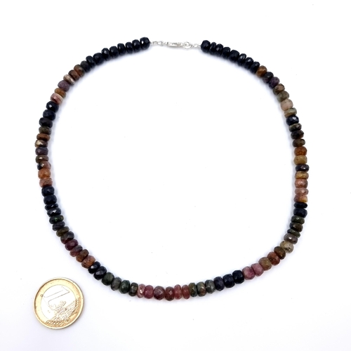 33 - A fine example of a 164 carat Tourmaline stone necklace, with stunning graduating multi coloured ton... 