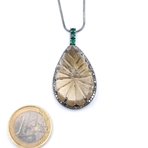 39 - A huge and attractive Lemon Quartz and Diamond tear drop pendant necklace, set with a sterling silve... 