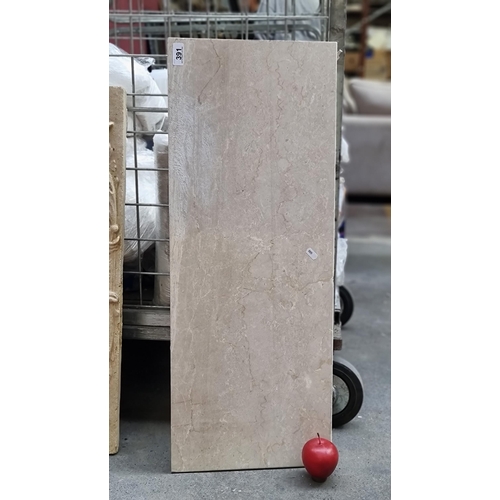 391 - A lovely example of a cream marble slab with delicate veining throughout. Many uses for this lovely ... 