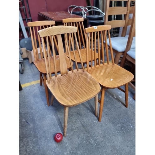 455 - A gorgeous selection of four Mid Century Modern dining chairs, three of which are a matching set. Al... 