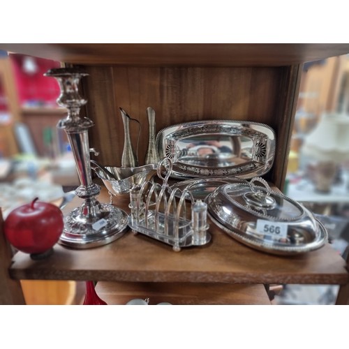 566 - A collection of eight antique silver plated items, including an unusual toast rack with salt and pep... 