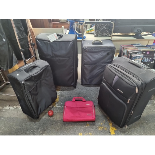 645 - Five high quality pieces of travel luggage, including Three large Itluggage rolling suitcases, an So... 