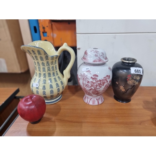 685 - Three Chinese porcelain items including a character jug, a red and white painted jar and a bud vase ... 