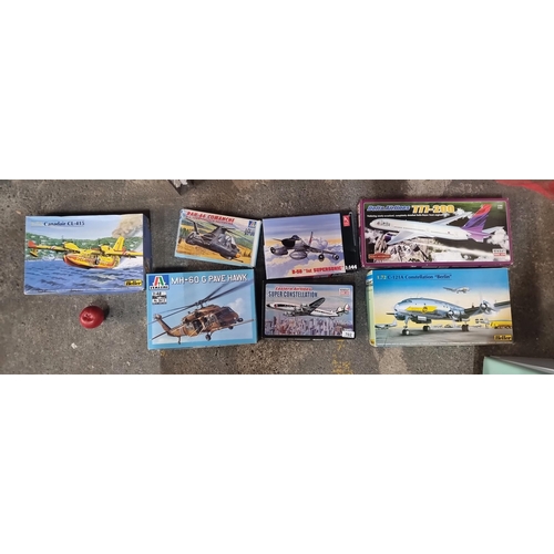 702 - A collection of seven vintage boxed model airplane kits. As pictured.