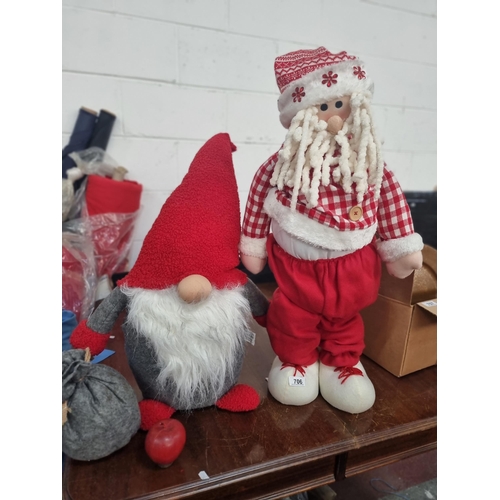 706 - Two charming Christmas home decorations consisting of a tall plush free standing Santa Claus (80cm t... 