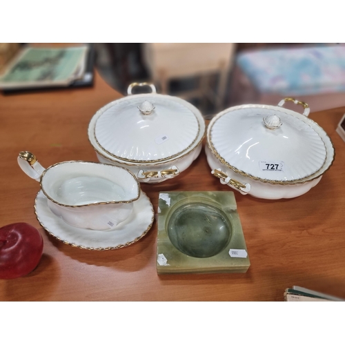 727 - A set of four pieces of Richmond Bone China in white with a gilt edge finish. In good condition. Wit... 