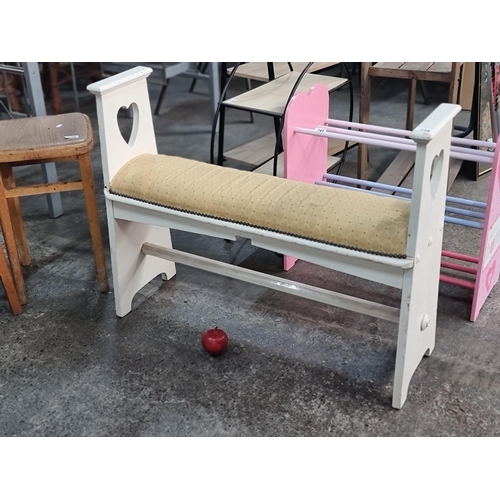 738 - A lovely vintage bench with loveheart cut outs and plush top upholstered in a cream brocade fabric.