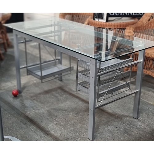 757 - A lovely  very sleek desk with tempered glass top and chrome tube legs with four sliding drawers for... 