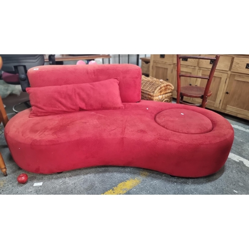 759 - A super cool retro serpentine sofa in a fabulous post modern style. Uphosltered in a flashy red fabr... 