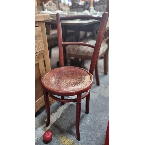 764 - A sweet vintage bentwood bistro chair with carved detail to seat.