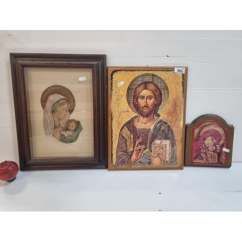 803 - Three prints on panel works featuring iterations of Jesus and Madonna and child.