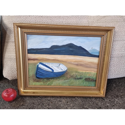 806 - An original acrylic on canvas painting showing a boat moored by the coast. Housed in a git frame.