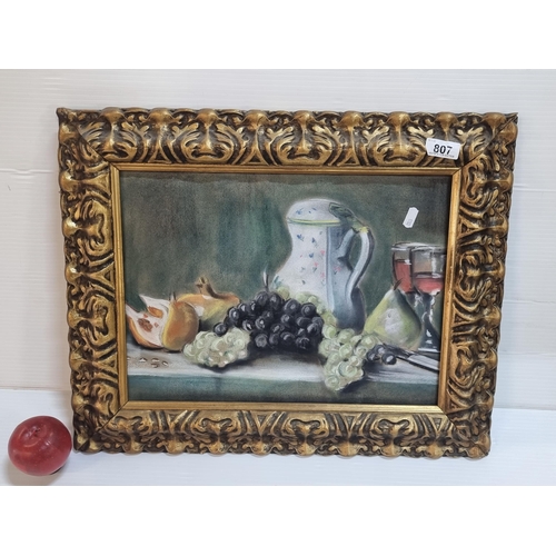 807 - A delightful original still life featuring grapes, jug, wine and other fruit in a display of differe... 