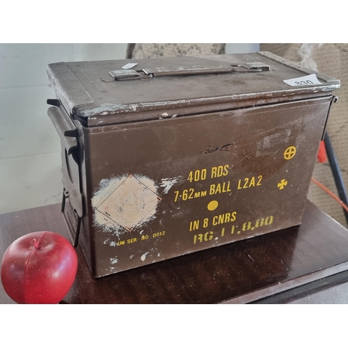 830 - A heavy cast metal military grade ammunition case, to contain 400 7.62mm ball cartridges. Dated to c... 