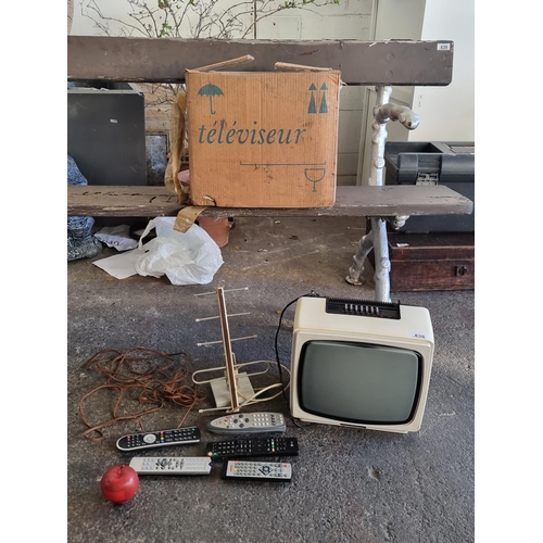 838 - A vintage  Brandt Electronique television with a free standing antenna. Dated to c. early 1980s and ... 