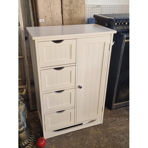 850 - A nice storage locker with panelled wood effect detailing, consisting of four drawers and a storage ... 