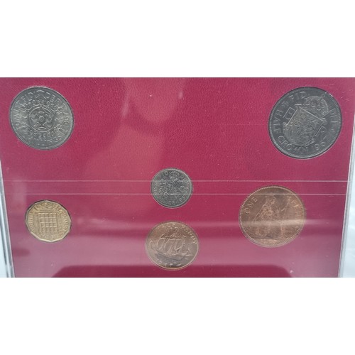 13 - Two collections of United Kingdom coinage, including a six coin set, circa 1967. Together with a Roy... 