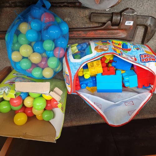 466 - Children's toys comprising of a bag of Mega Bloks and a box of ball pit balls.