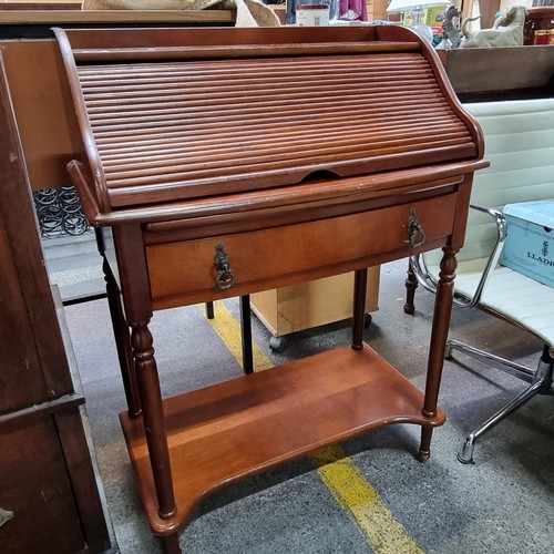 499 - A beautiful tambour writing desk with four inside drawers and one large drawers on the facade, with ... 