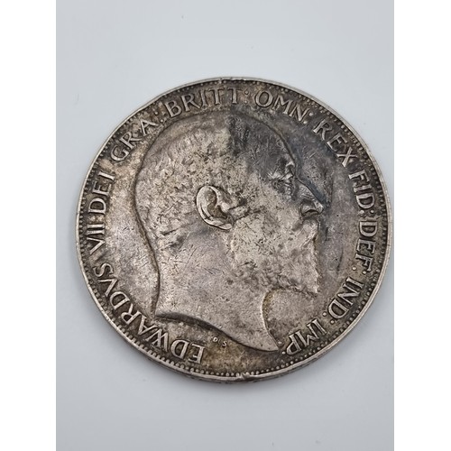 524 - An Edward VII English crown, circa 1902 with a 92.2% silver content. Coin in clean, fine condition.