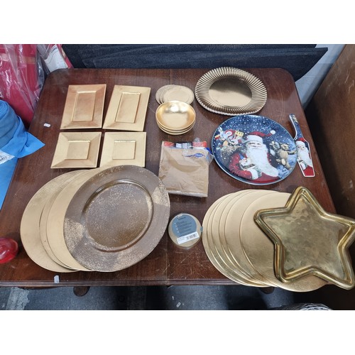 707 - A super collection of Christmas table ware consisting of gold toned plates and dishes perfect for yo... 