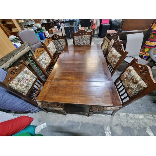 787 - Star Lot : A magnificent seven piece Victorian dining suite comprising of a large extendable oak din... 