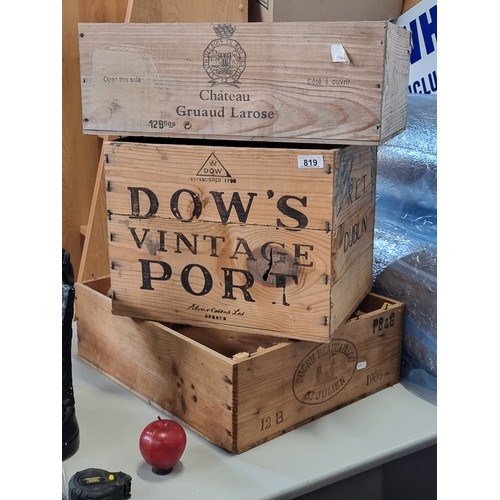 819 - A selection of three vintage wooden box designed to transport goods, including one stencilled Dows V... 