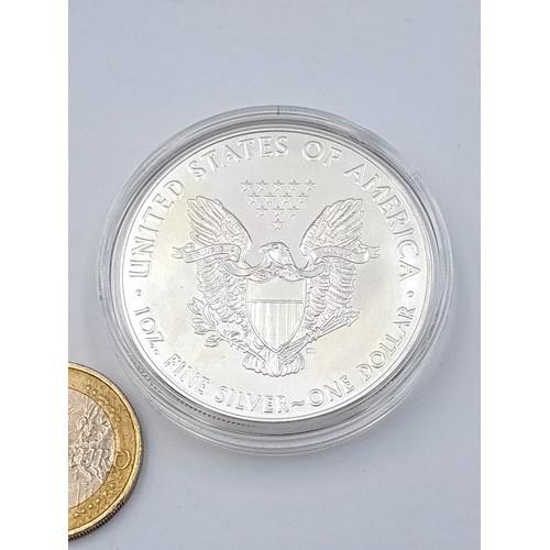 456 - An United States of America one ounce .999 fine silver one dollor coin, dated 2020. Set in protectiv... 