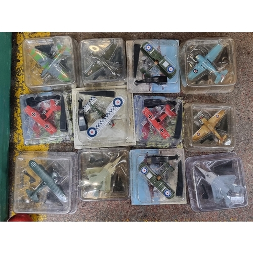 596 - A selection of twelve, boxed, model airplanes (1:72). Including a 1931 Bristol Bulldog 19th Squadron... 