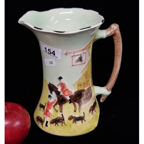 154 - A ceramic pitcher vase. With a charming pale green background and handpainted equestrian figures. In... 