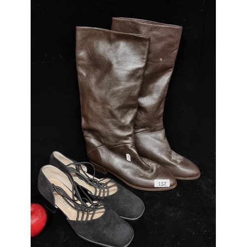 157 - Two pairs of new ladies' shoes. Including a pair of genuine leather calf length boots by designer br... 