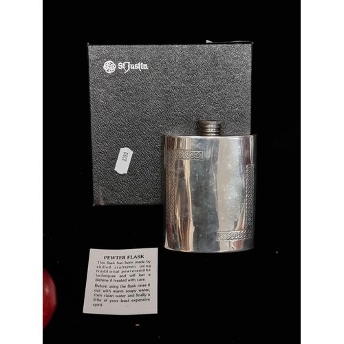 170 - A very lovely example of a pewter hip flask by St. Justin giftware. Beautifully decorated with an or... 