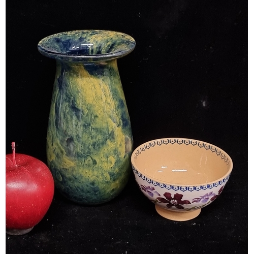 206 - Two collectible items including a hand-blown art glass vase with a Nicholas Mosse spongeware sugar b... 