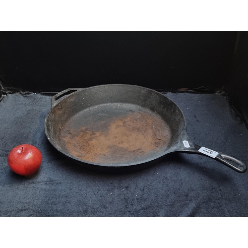 327 - A Lodge branded, very large, heavy cast iron skillet pan. D14''. RRP €184 on www.homeloft.ie