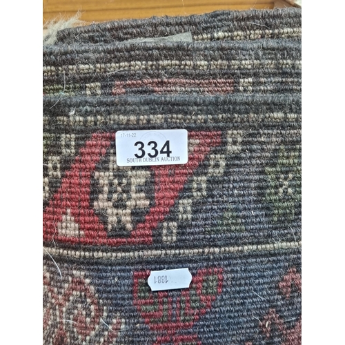 334 - A beautiful, hand woven Berber hall runner. Crafted in a rich red shade with brown and olive green d... 